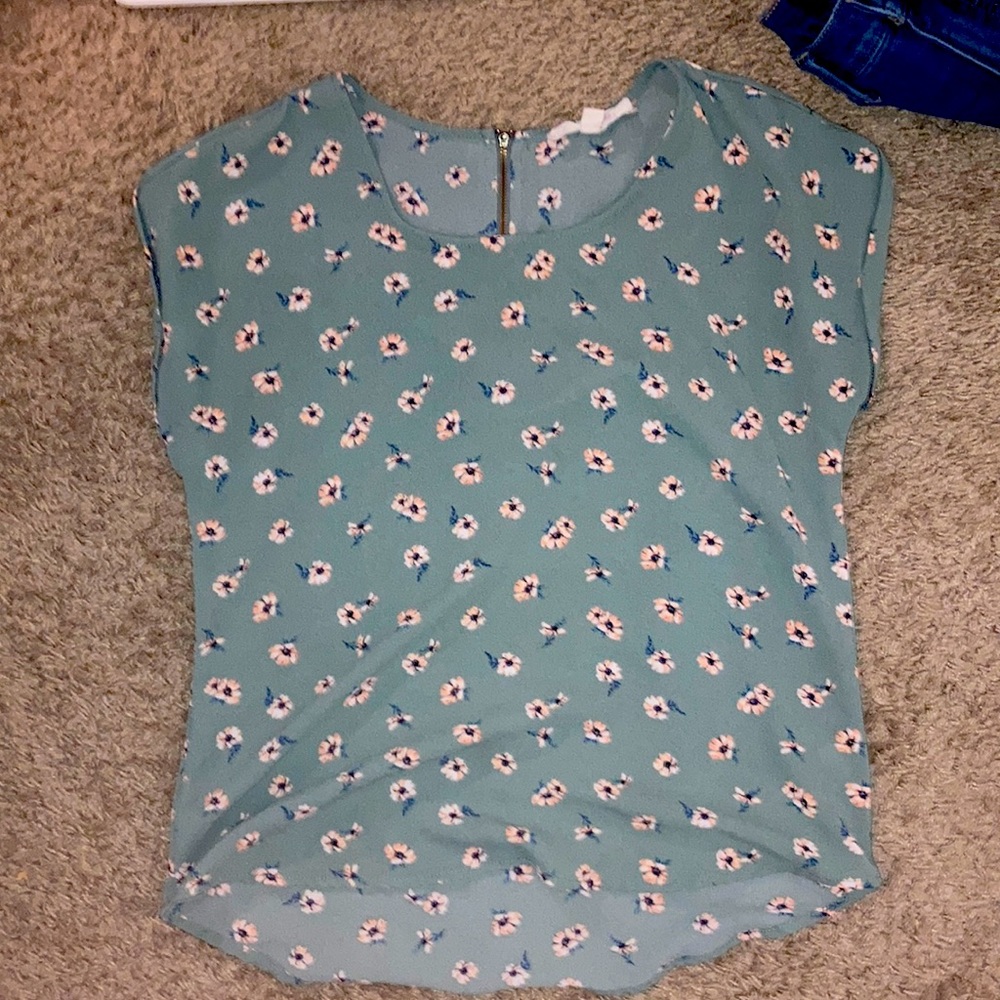Green short sleeve shirt with light pink flowers